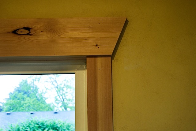 Simple pine trim with angled ends on the header casing